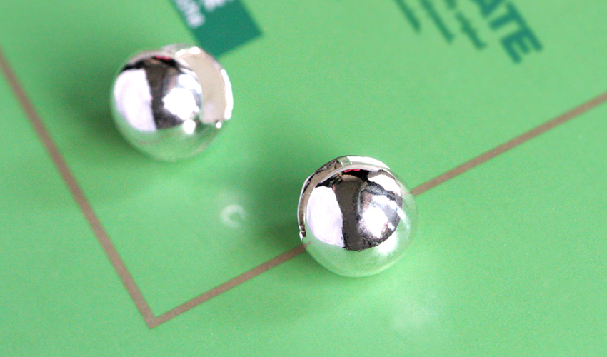 Silver ball one touch earring