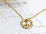 Gold peace necklace
