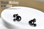 Black mickey piercing